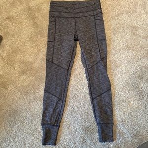 Athleta dark heather gray leggings with pockets. Size S.